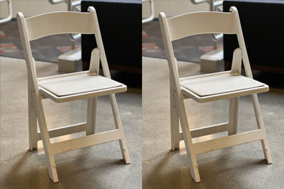 White padded resin chair